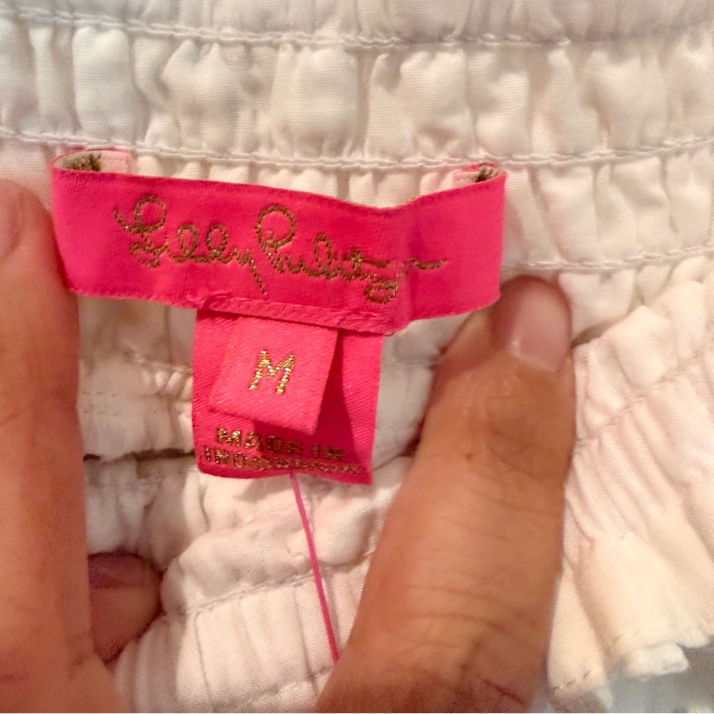 Your summer goto Lilly Pulitzer White Eyelet Off-Shoulder Tunic with PomPom Trim - Picture 9 of 10